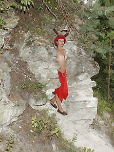 Forest Satyr On The Rock