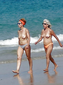 Two Milfs Topless Walking