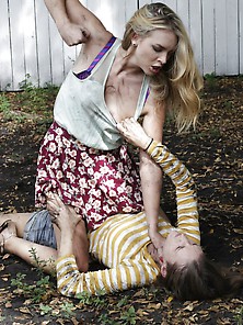 Two Playful Girls Enjoy Mud Wrestling,  One Of Them Blows A Hung