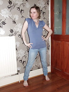 Cute Blonde Posing In Jeans And Shirt