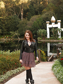 Redhead Girl Pulls Skirt