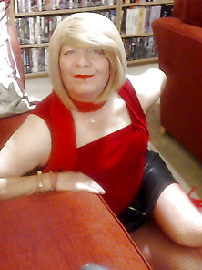 Linda In Leather Mini-Skirt And Red Fishnet Stockings